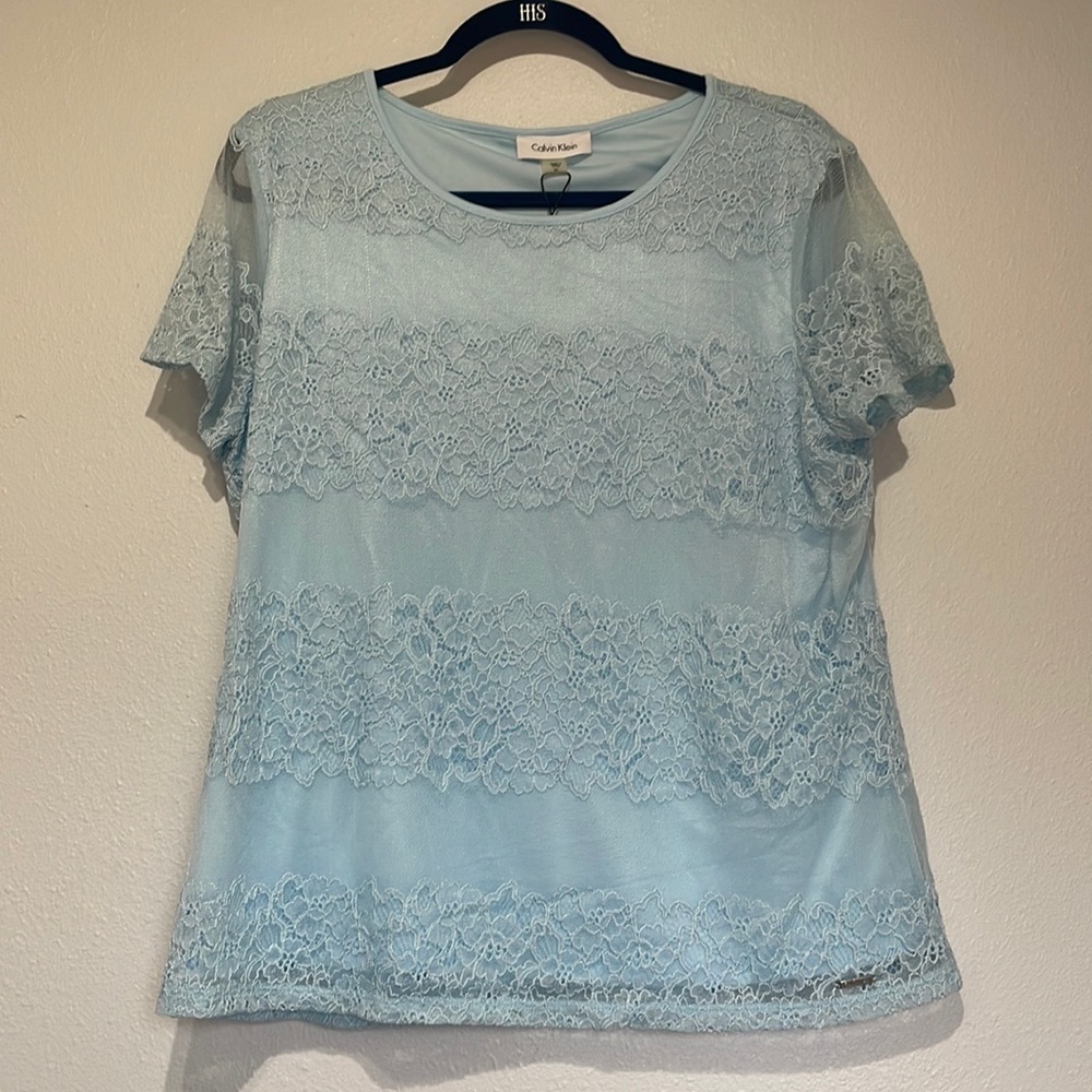 Calvin Klein size XL baby blue blouse